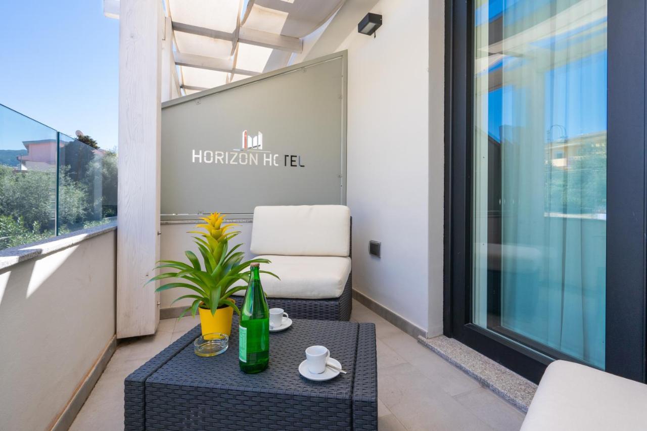 Horizon Hotel Badesi Bagian luar foto